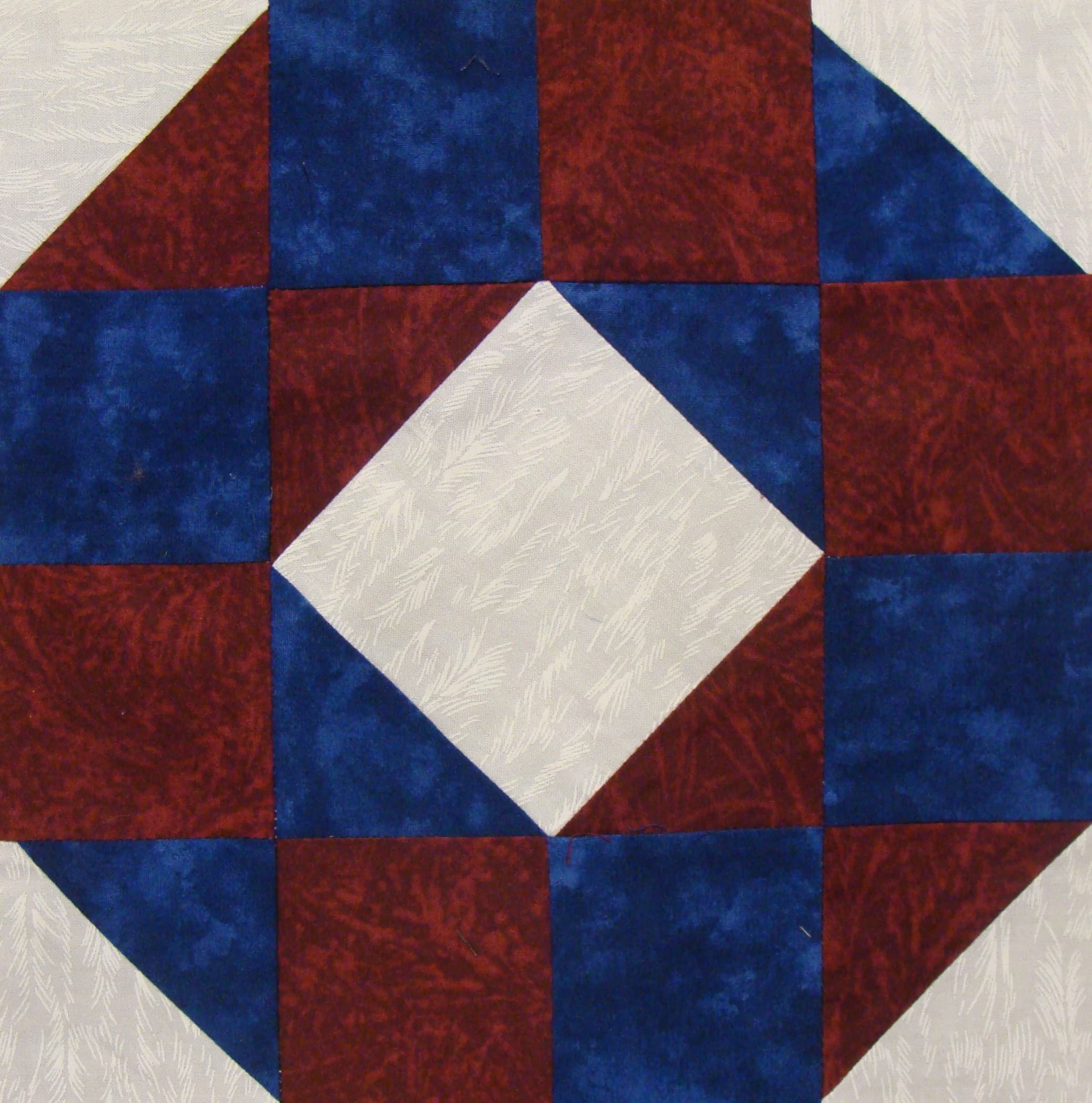 NF11 — Maroon, Hunter Green, Navy & White quilt block