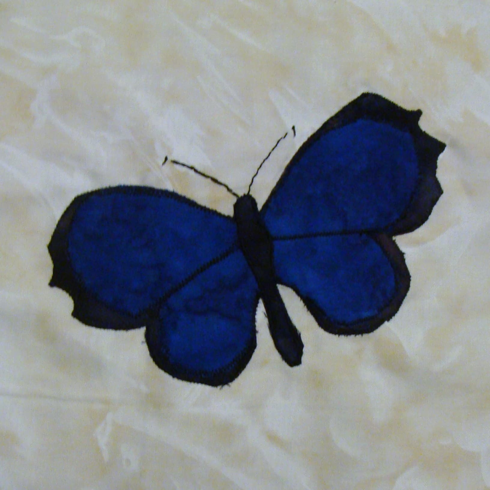 NF29 — Batik Butterflies quilt block