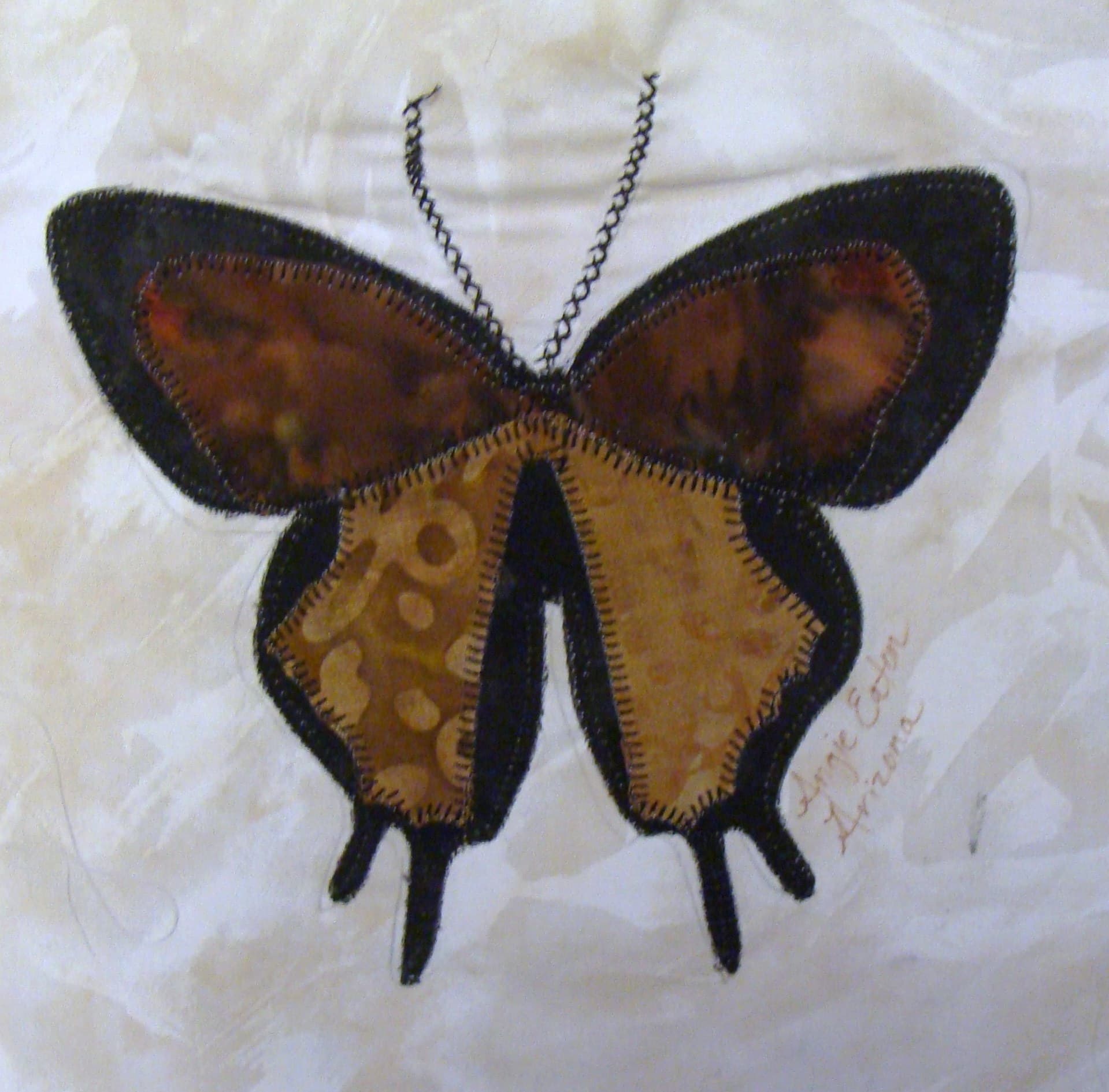 NF29 — Batik Butterflies quilt block