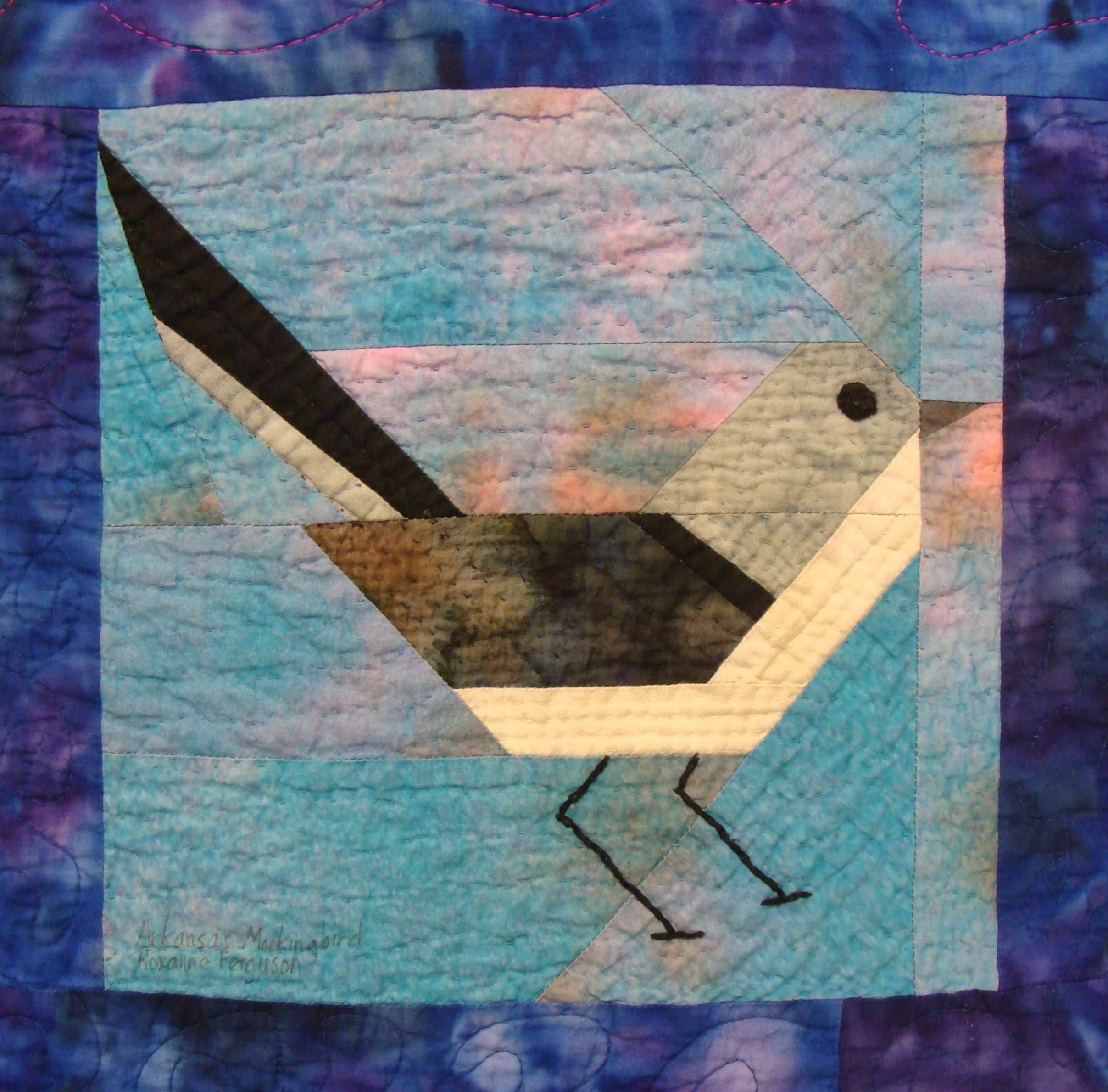 NF12 — Batik & Fossil Fern on Black quilt block
