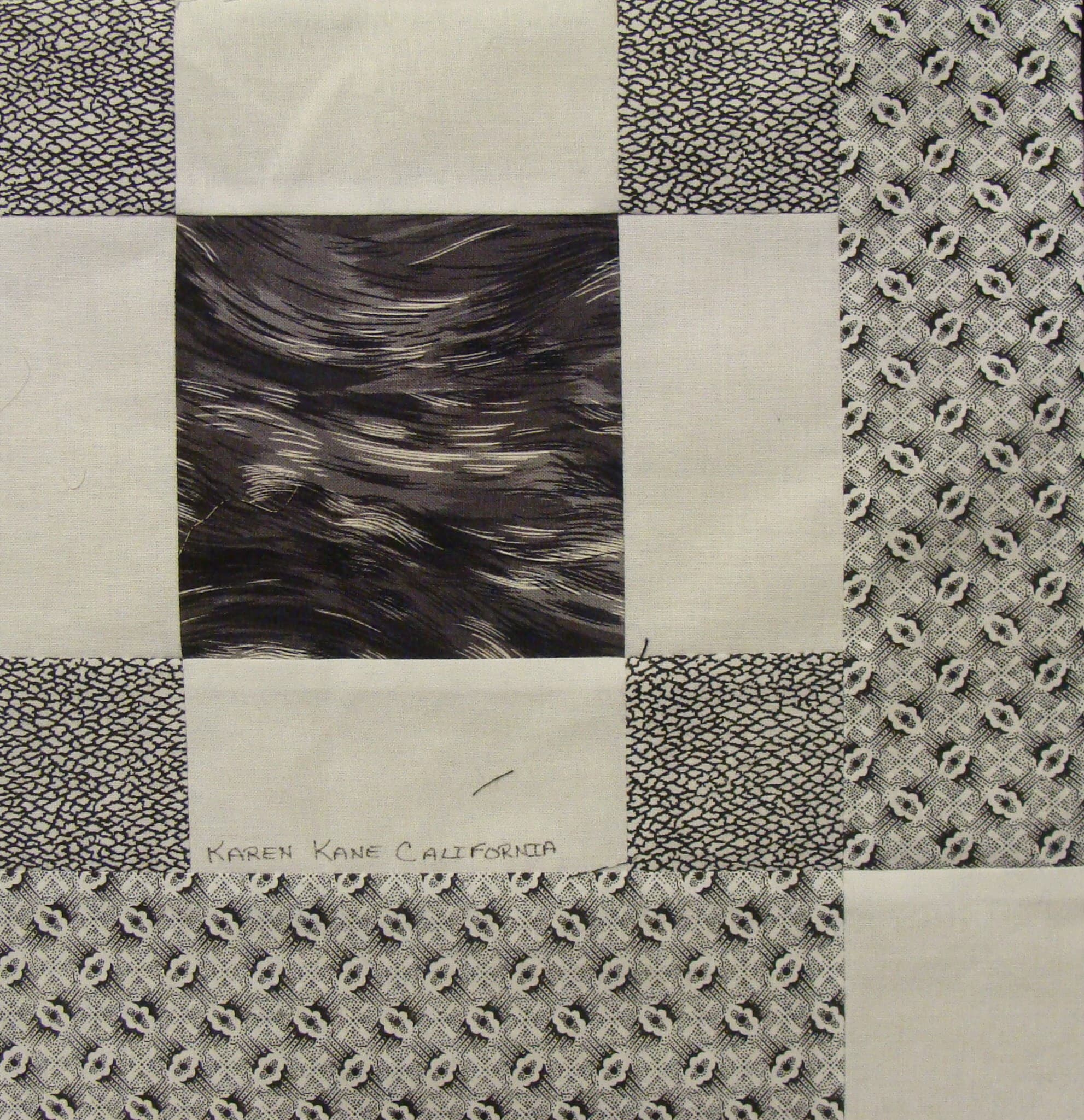 NF15 — Black & White on White quilt block