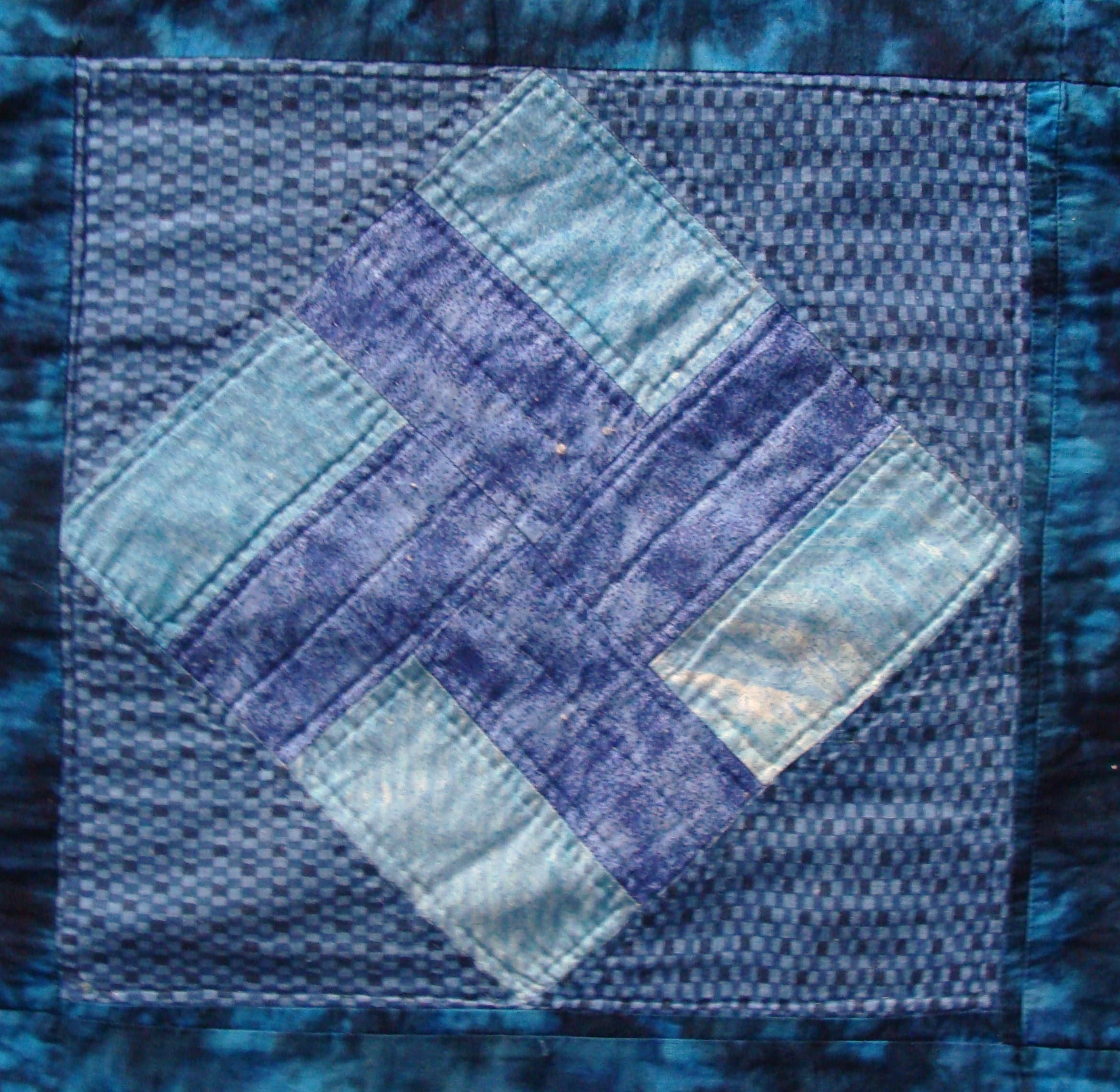 NF4 — Blue, Plum & White quilt block