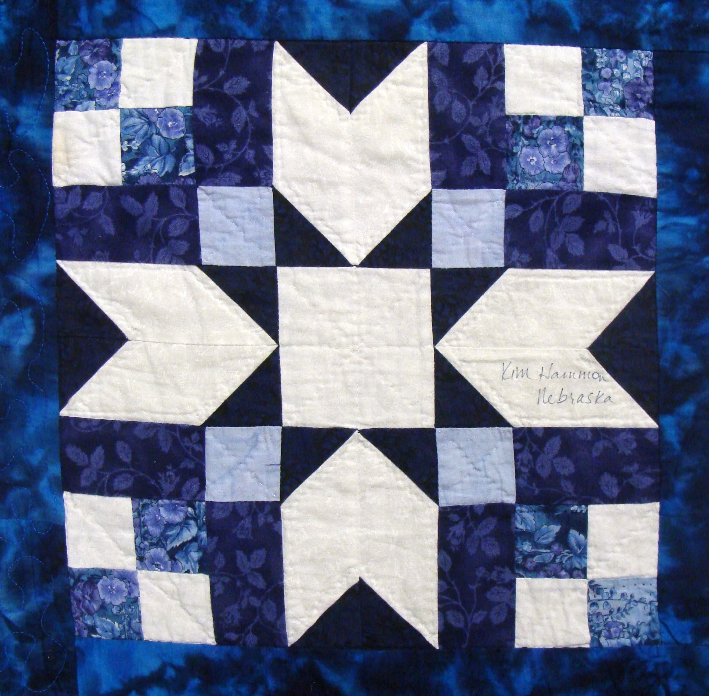 NF9 — Teal, Blue & White quilt block