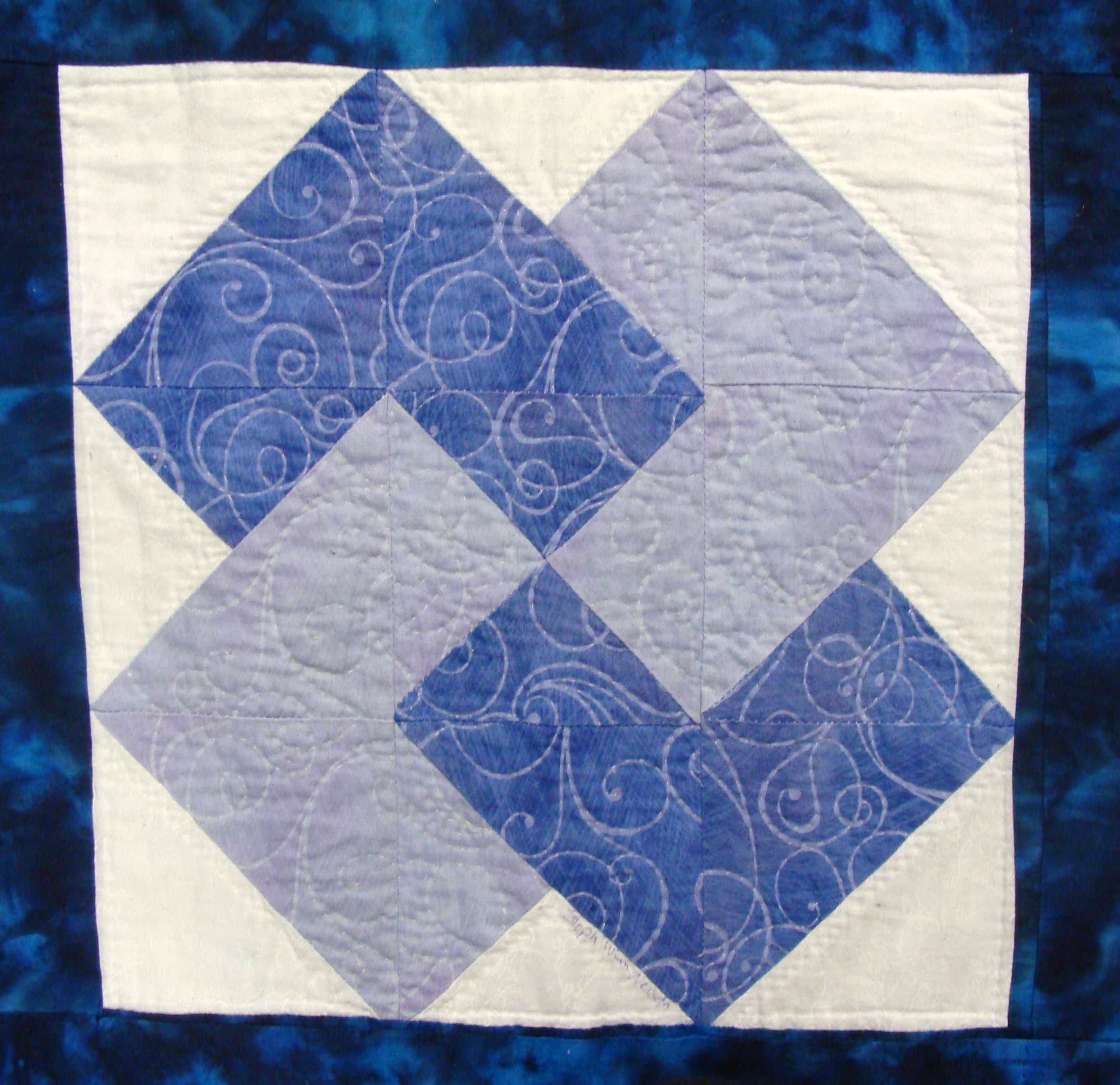 NF9 — Teal, Blue & White quilt block