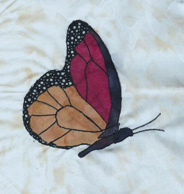 NF29 — Batik Butterflies quilt block